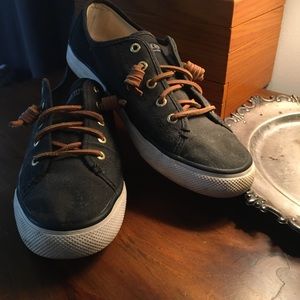 Black and gold sperrys